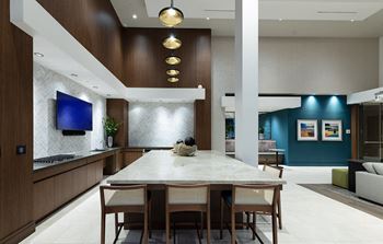 Resort-Style Pool Deck with Private Cabanas, Cozy Fireplace, and Grilling and Dining Areas at Kinley West LA, Los Angeles, 90045